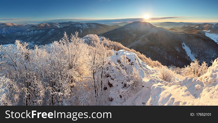 Winter landscape with village