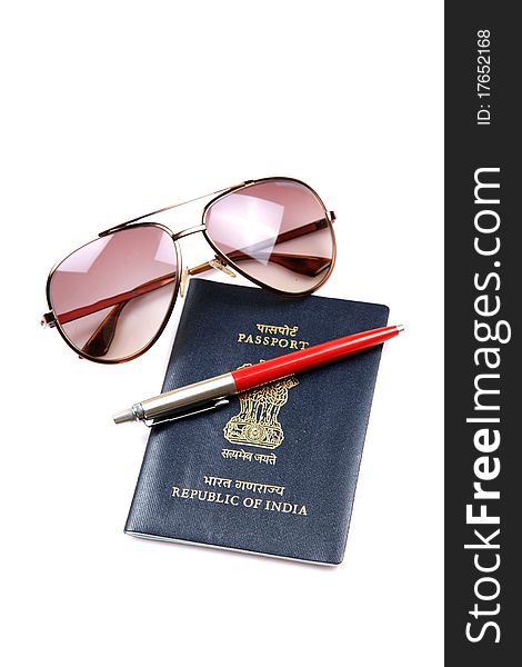 Concept shot of indian passport with pen and goggles over white background. Concept shot of indian passport with pen and goggles over white background.
