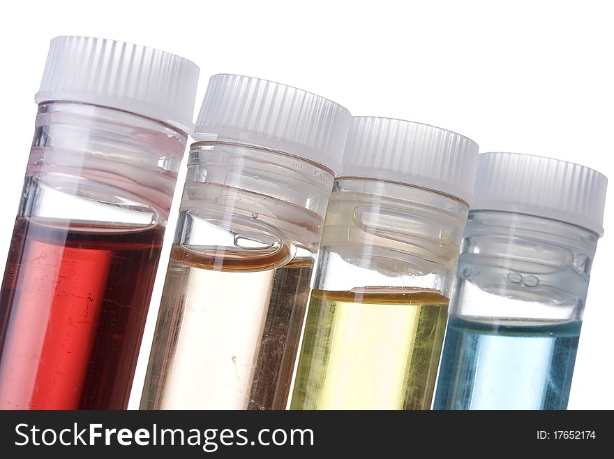 Test tubes with different liquids on a white background.