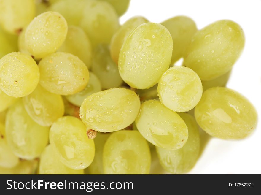 Fresh green grapes isolated on white (shallow DOF)