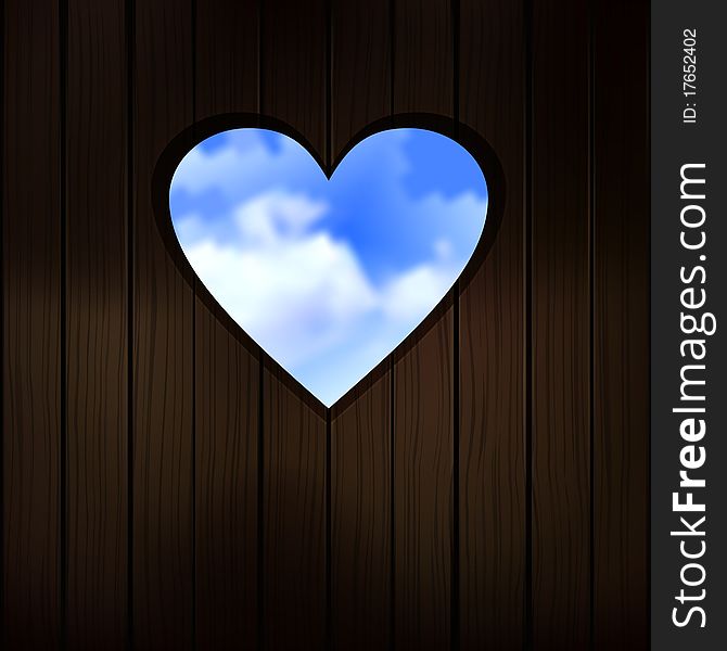Heart shape cut into wooden door. Heart shape cut into wooden door