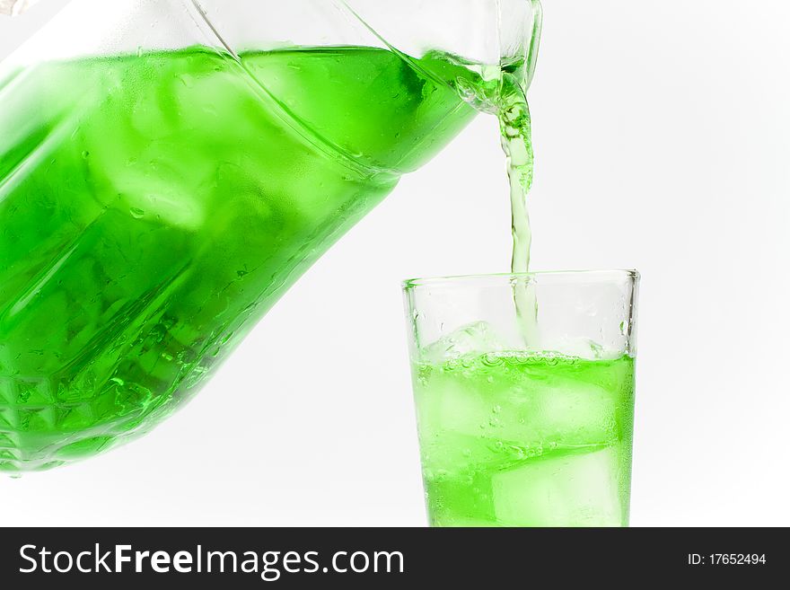 Green cold drink poured a glass