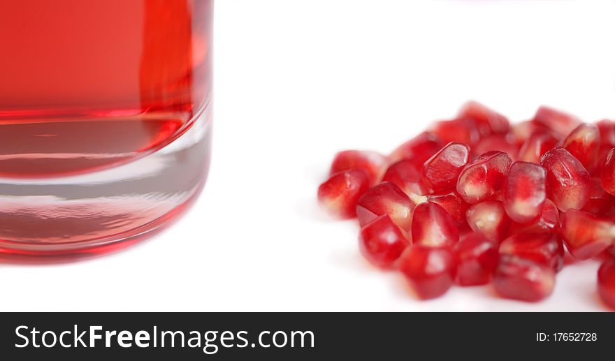 Fresh pomegranate flesh and juice (shallow DOF)