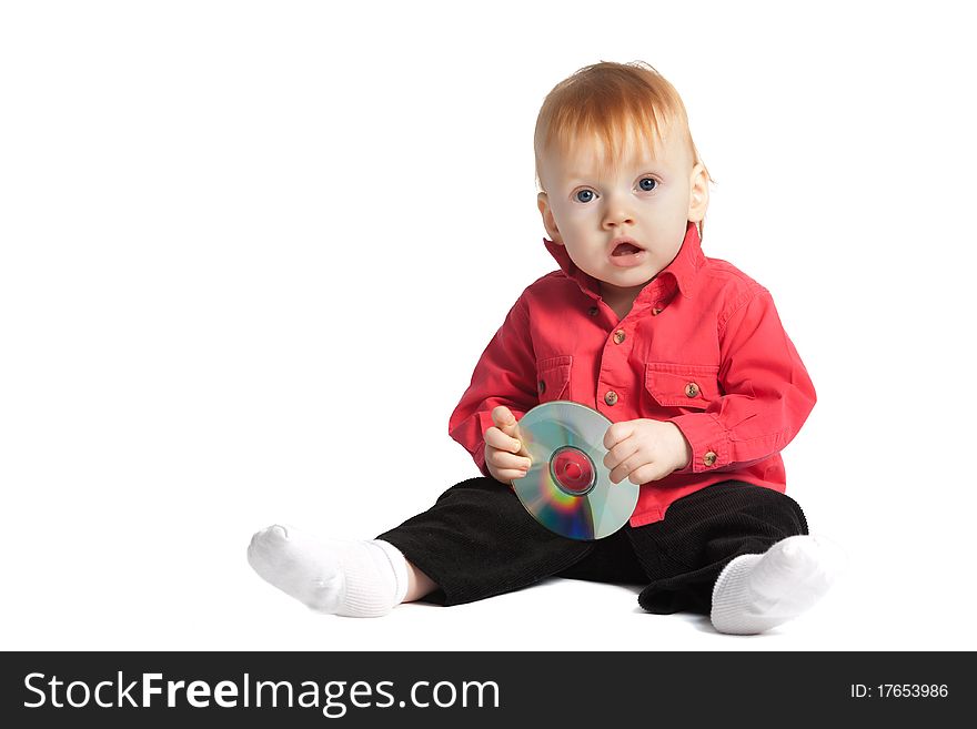 Baby holds cd isolated on white background
