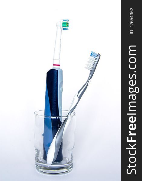 Electric And Manual Tooth-brush In A Glass