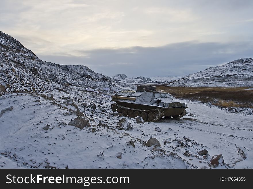 All-terrain vehicle standing in mountainous area close to Barents Sea in Kola Peninsula (Russia). All-terrain vehicle standing in mountainous area close to Barents Sea in Kola Peninsula (Russia)