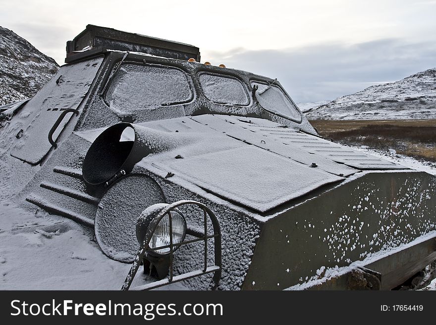 All-terrain vehicle standing in mountainous area close to Barents Sea in Kola Peninsula (Russia). All-terrain vehicle standing in mountainous area close to Barents Sea in Kola Peninsula (Russia)