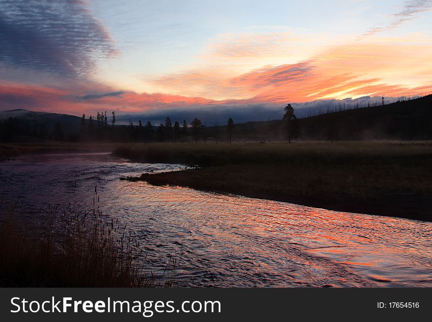 Fall sunset along the Gibbon River in Yellowstone National Park. Fall sunset along the Gibbon River in Yellowstone National Park.