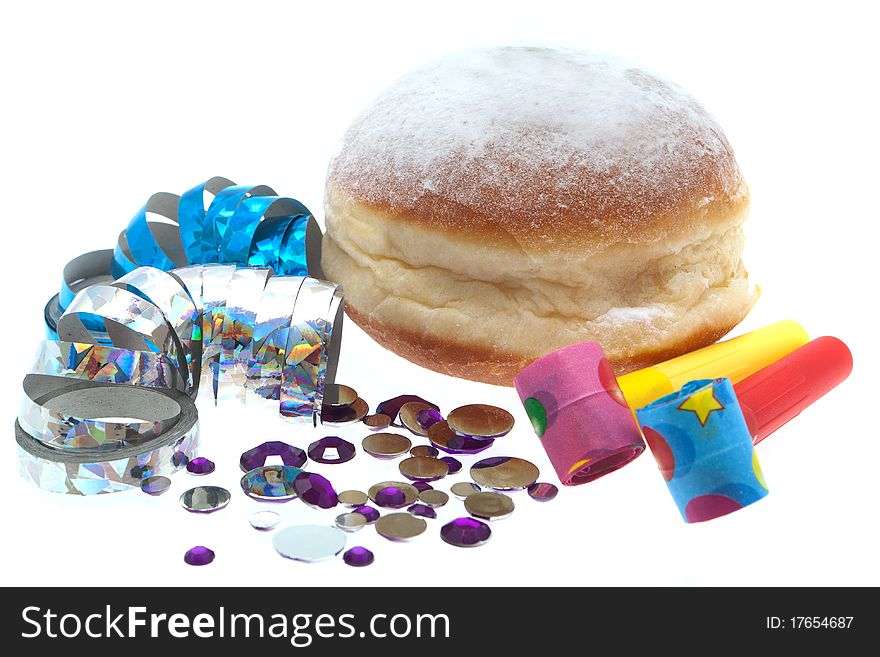 Jelly Doughnut with party decoration, streamer and confetti against white background