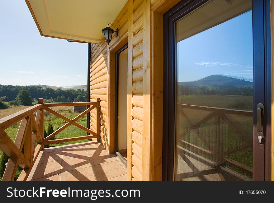 View from the terrace of a new wooden mountain house.