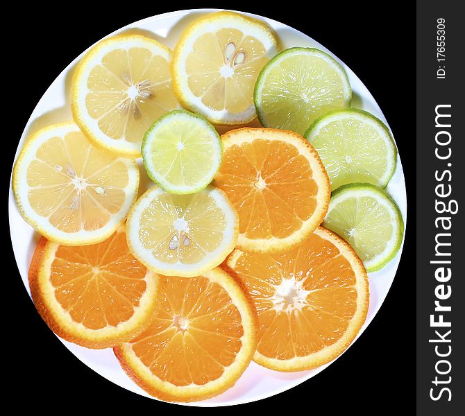 Plate of sliced citrus fruits. Plate of sliced citrus fruits