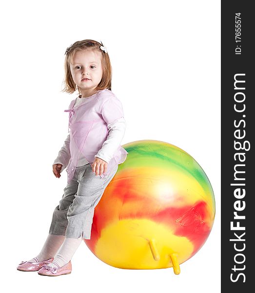 Little girl sitting on fitball isolated