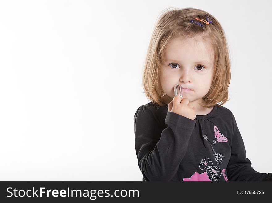 Little funny girl with lipstick. Little funny girl with lipstick