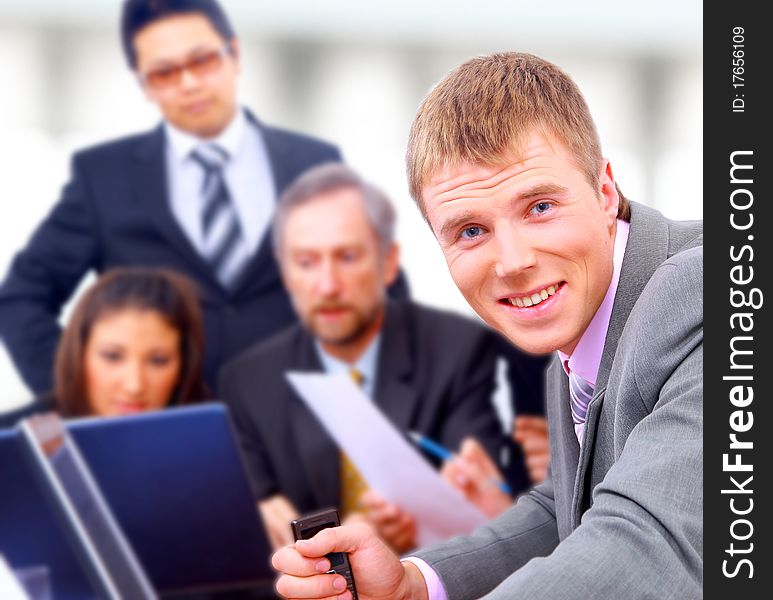 Smiling business people team working in the office