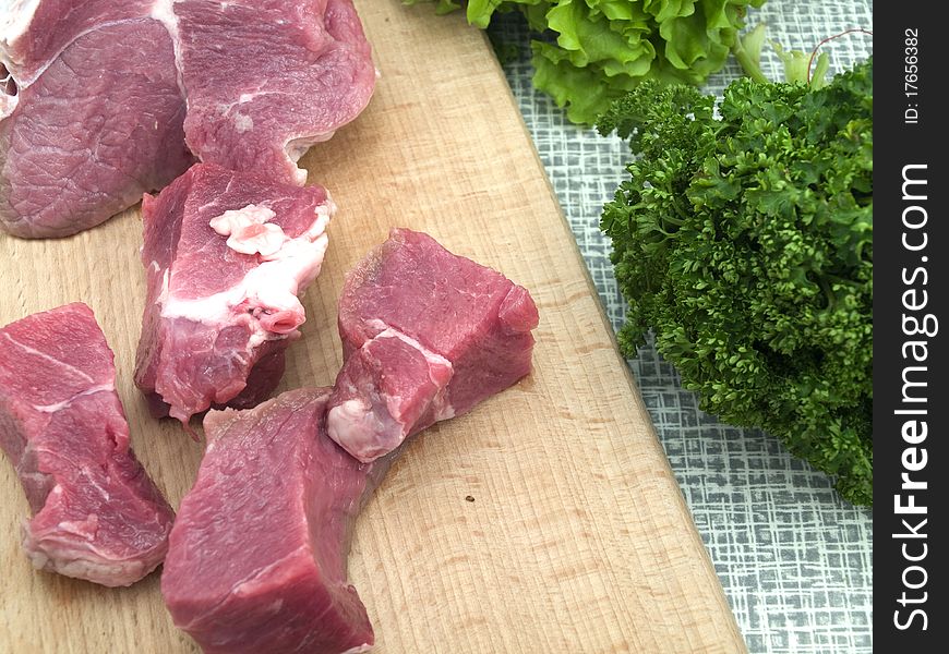 Meat on a kitchen board