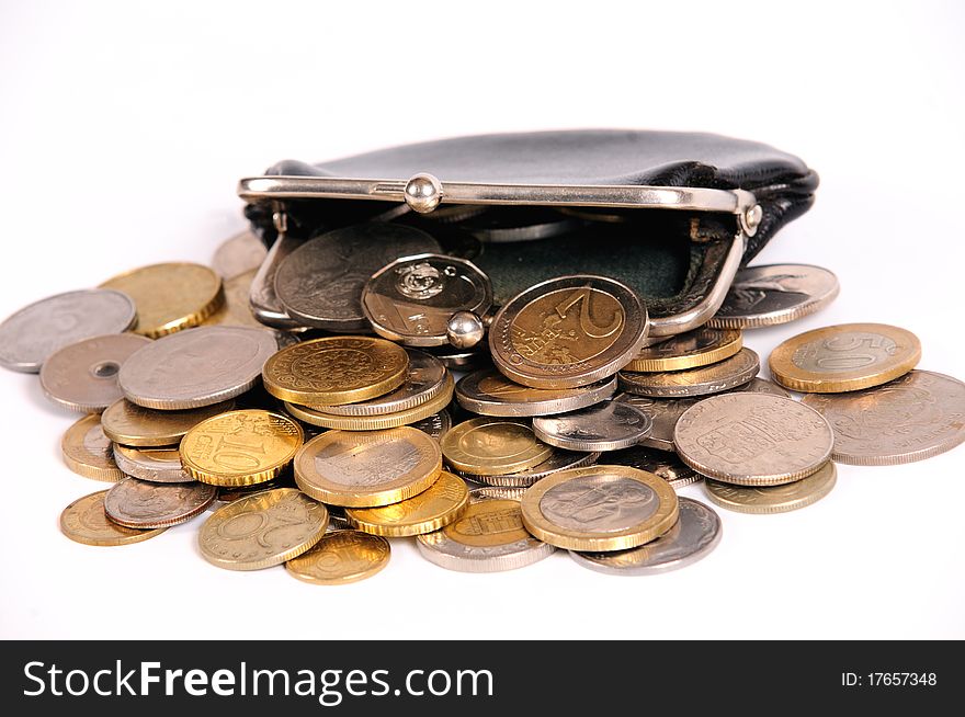 Purse with coins on white isolated background