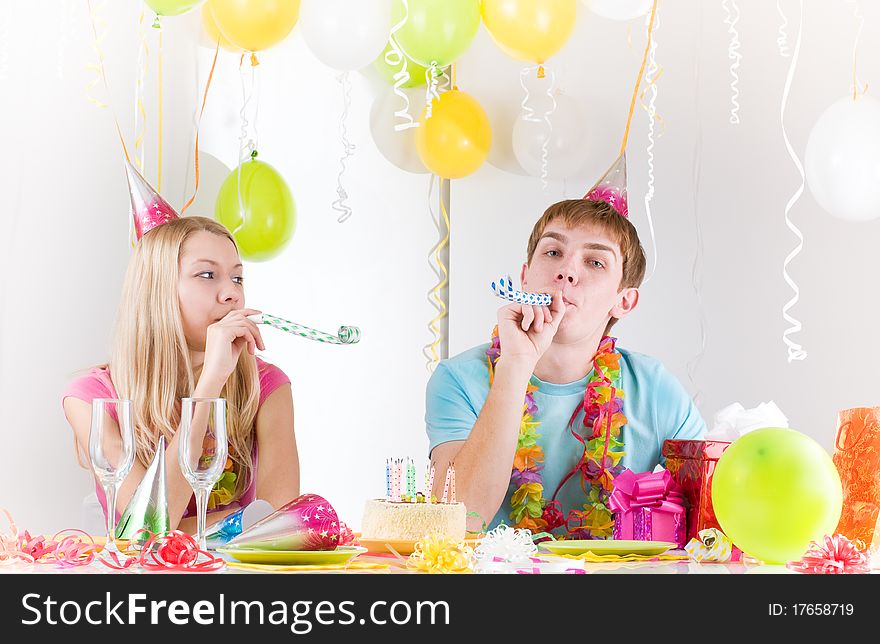 Young happy smiling couples at birthday. Young happy smiling couples at birthday