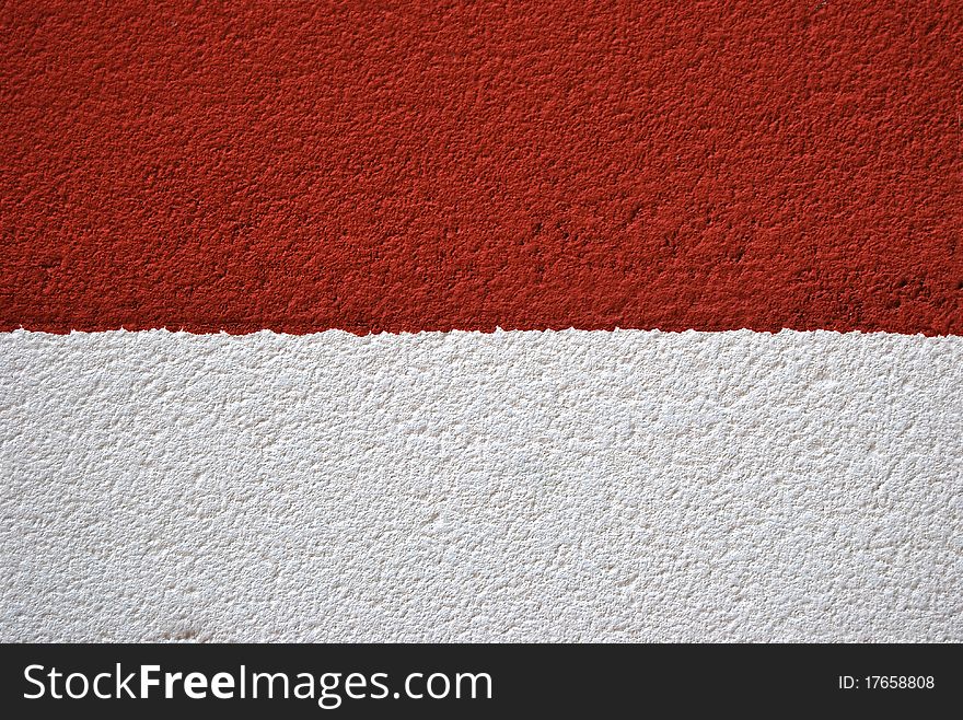 Painted canvas, red and white colors on rough surface. Painted canvas, red and white colors on rough surface