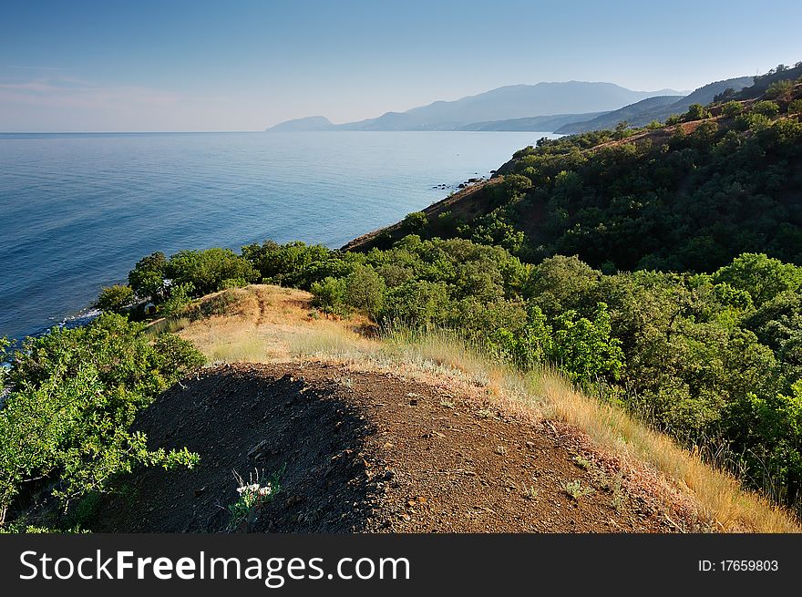 Summer day landscape with the sea and mountains. Ukraine, Republic of Crimea. Summer day landscape with the sea and mountains. Ukraine, Republic of Crimea