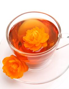 Cup With Tea And A Flower Stock Images