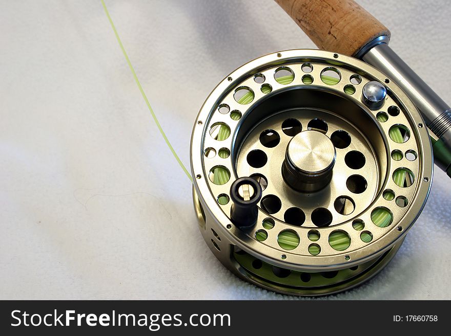 Close up of a fly fishing reel.