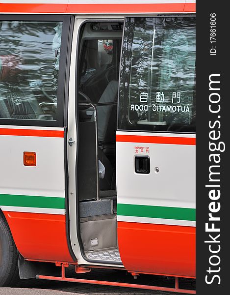 Opened door of mini bus, refer to enter, transportation or travel, and way to get in.