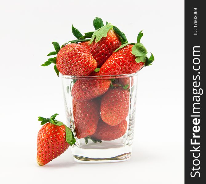 Strawberry and glass - isolated over white space