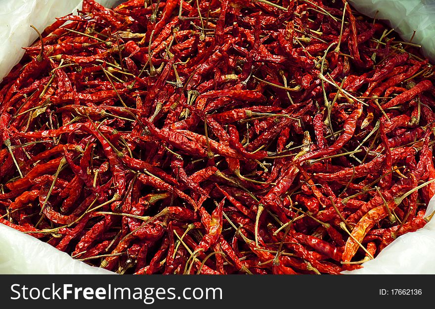 Red chili is very hot. Red chili is very hot