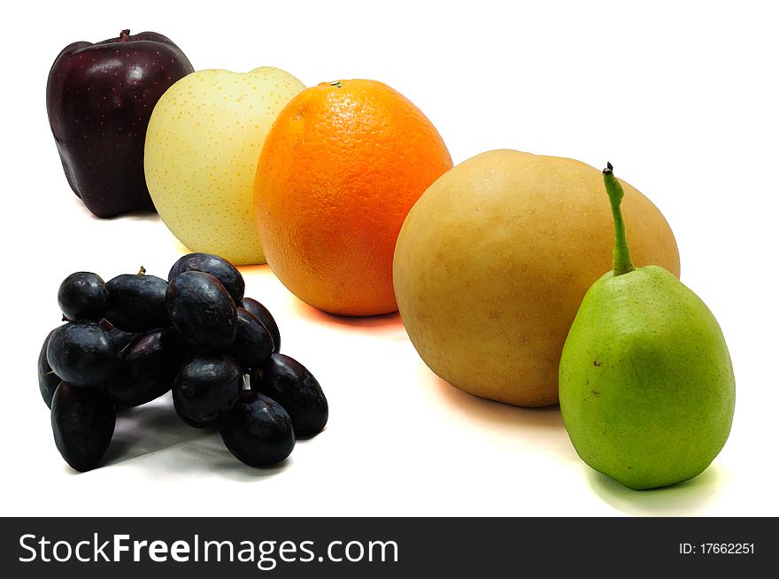 Tropical fruits against white background. Tropical fruits against white background