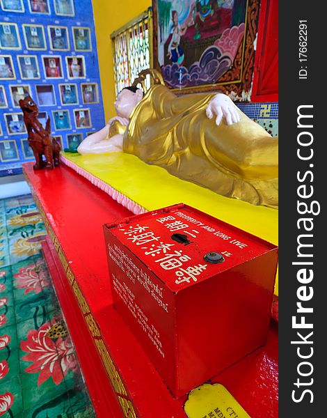 Lying Buddha statue in a temple in Malaysia