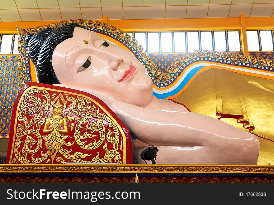 Lying Buddha statue in a temple in Malaysia