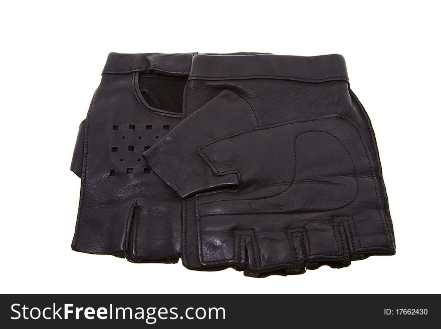 The isolated leather black gloves with the cut off fingers. The isolated leather black gloves with the cut off fingers