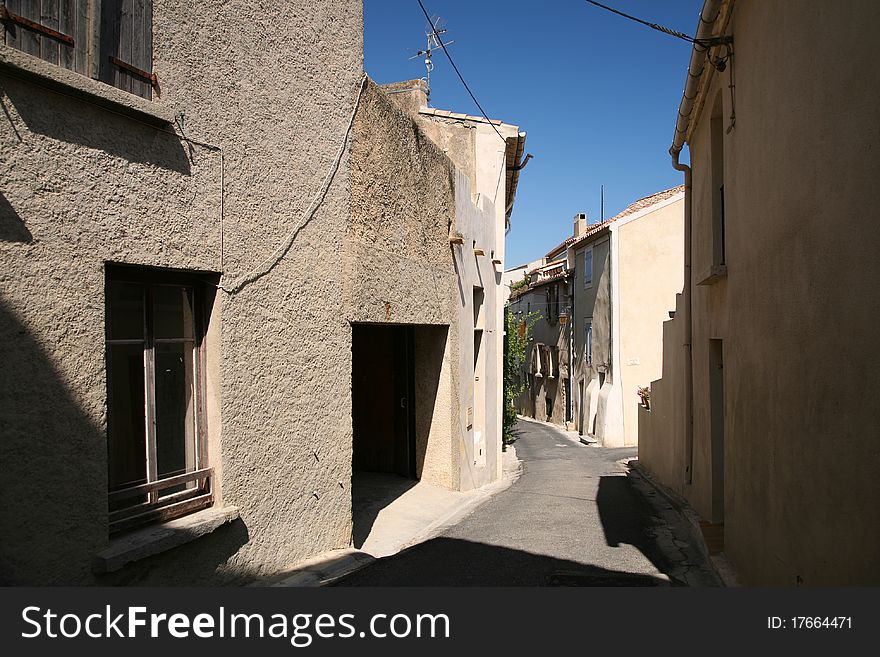 An empty French village street, Bages, in sunshine