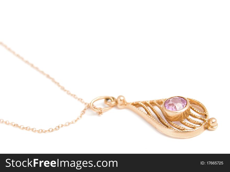 Gold coulomb with amethyst, is isolated on a white background