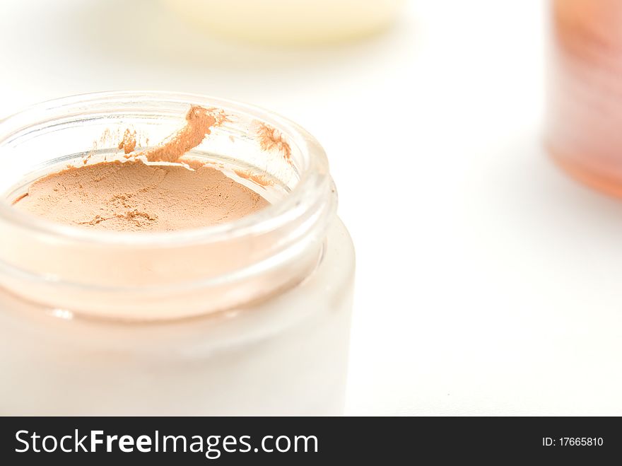 Cosmetic cream bottles on a white background