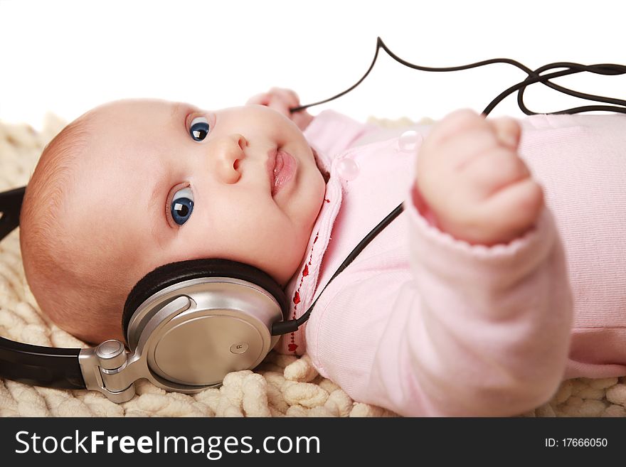 Beautiful little girl listening to the music. Beautiful little girl listening to the music