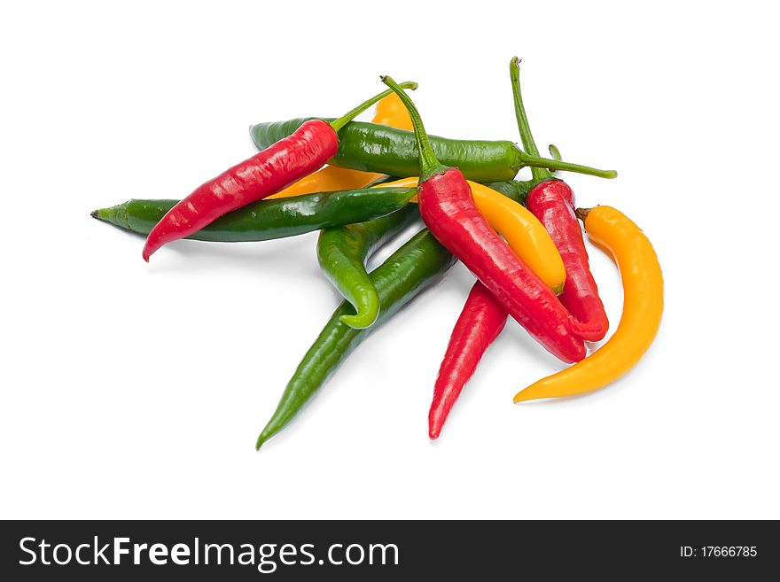 Multicolor chili peppers isolated on white background