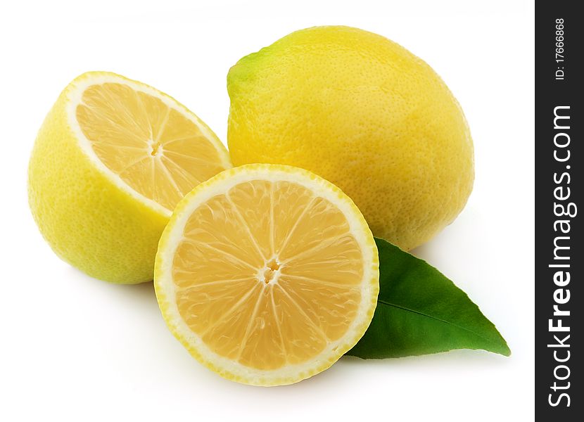 Lemon with leaves on a white background