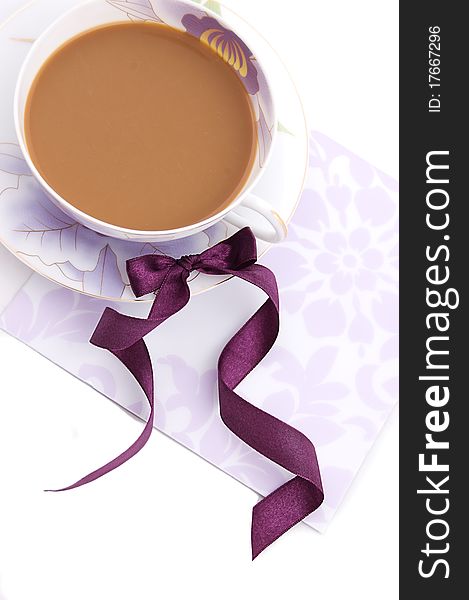 Cup of cappuccino blank note and violet ribbon. Cup of cappuccino blank note and violet ribbon