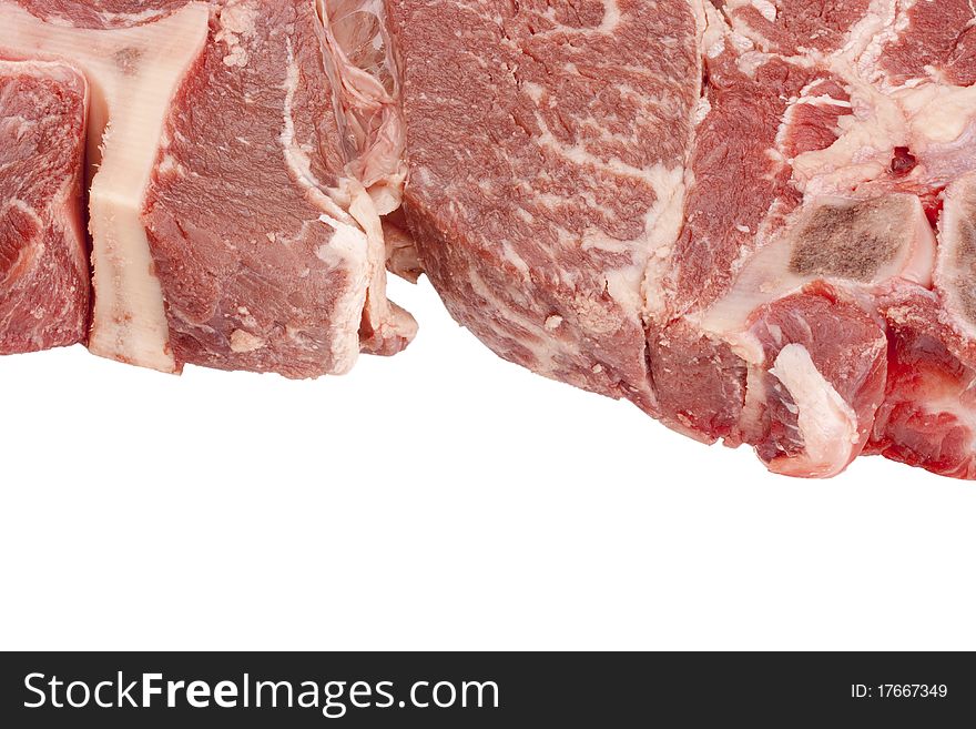 A large piece of raw meat on a white background.