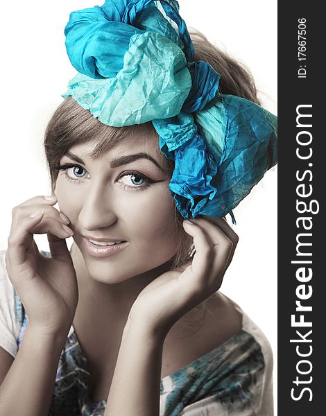 Portrait of young beautiful woman with blue bow. Portrait of young beautiful woman with blue bow