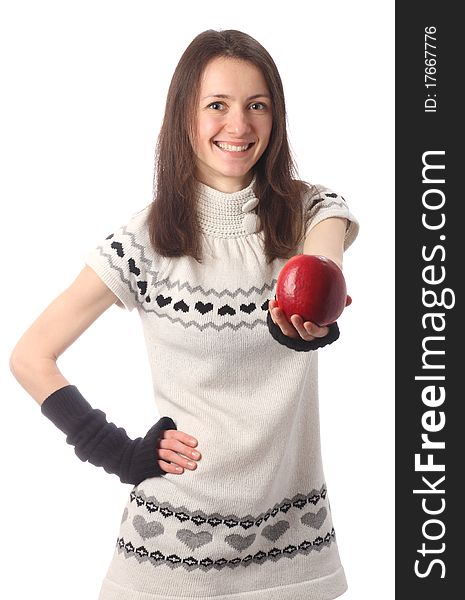 Happy fashionable young woman offering red apple