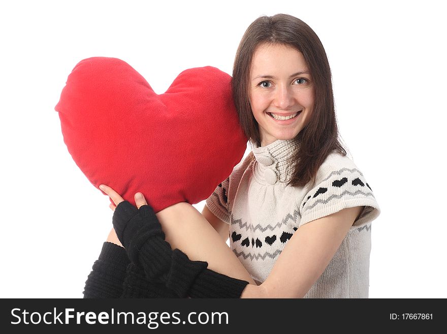 Young fashionable woman holding red heart