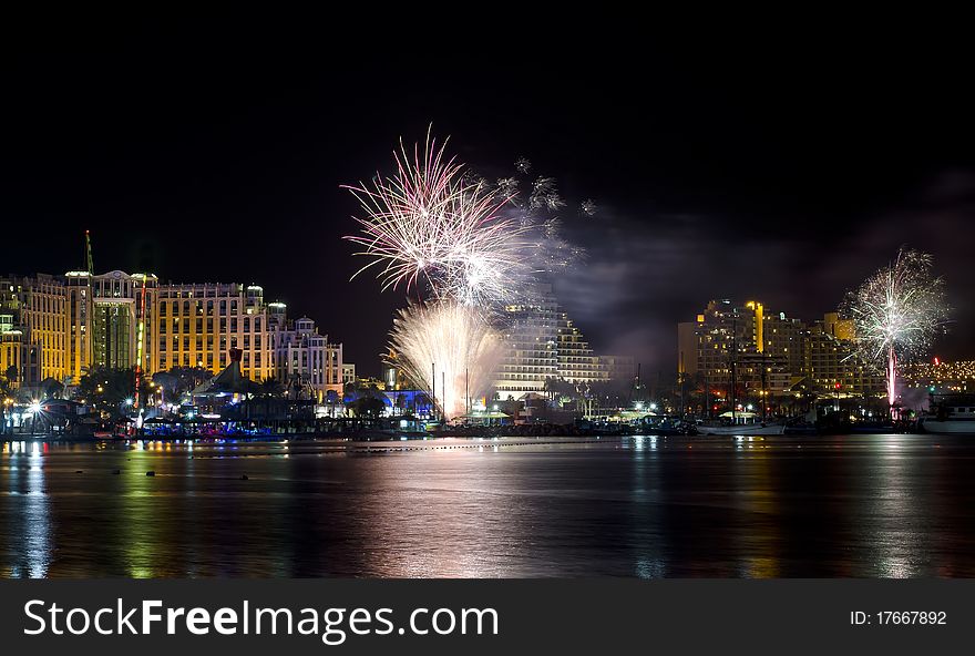 During holidays and celebrations there are beautiful festive fireworks on the main promende of Eilat city in Israel. During holidays and celebrations there are beautiful festive fireworks on the main promende of Eilat city in Israel