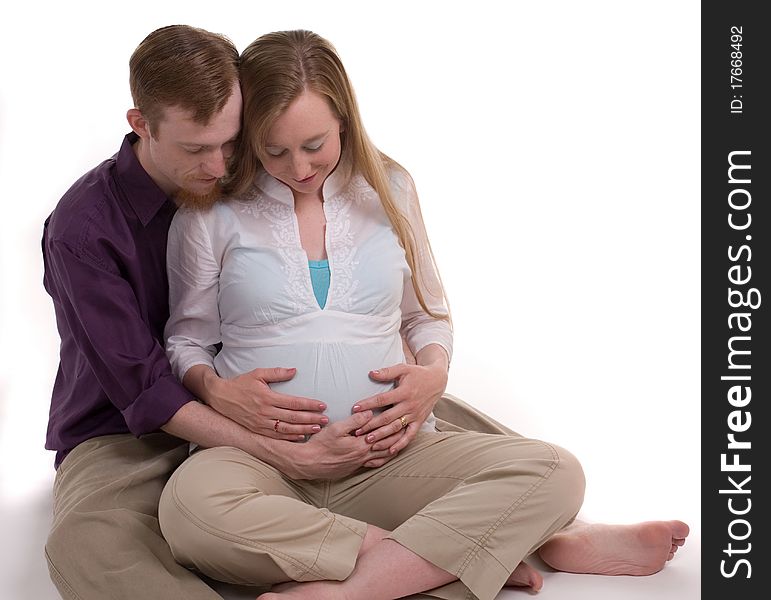 Young couple expecting their first child. Young couple expecting their first child