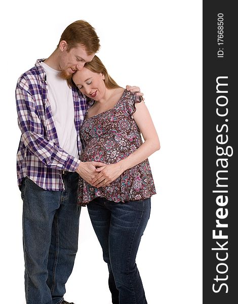 A young couple expecting their first child. A young couple expecting their first child.