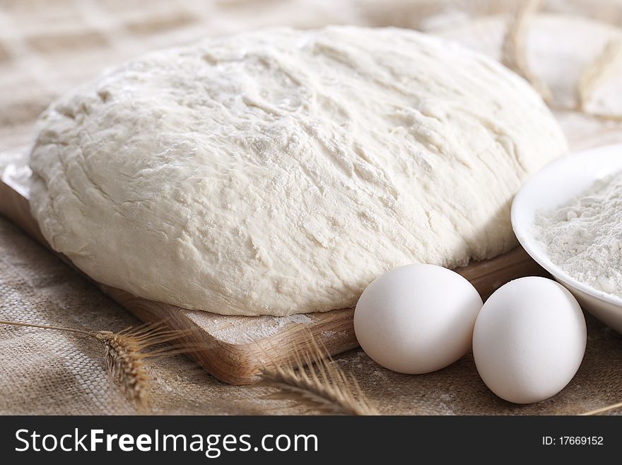 Baking fresh bread background, dough