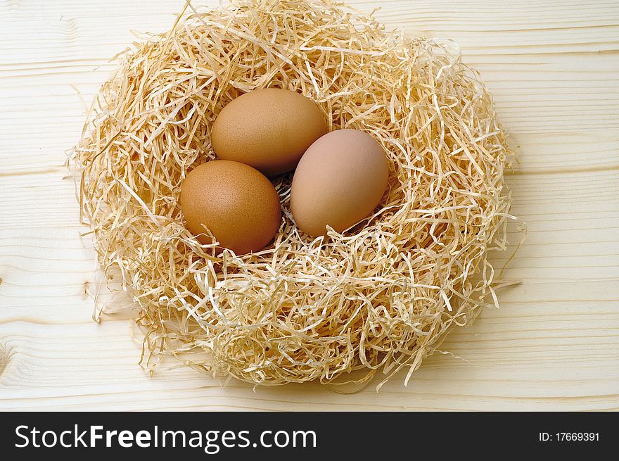 Eggs in a nest of straw