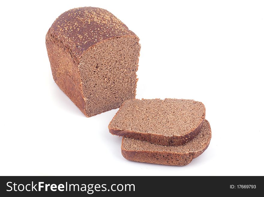 Sliced bread with many seeds isolated on white background.