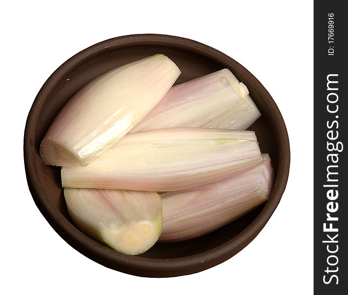 Sliced onions dish on white background